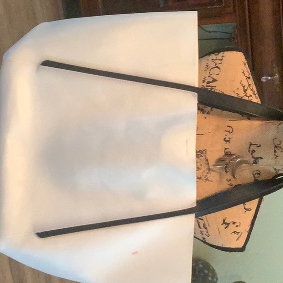 Jessica Simpson large tote. Has red spot on back and black spot on front. - Picture 2 of 4